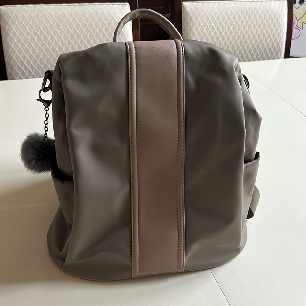 Cute backpack purse. Used only once. Stylish and plenty of storage as well.